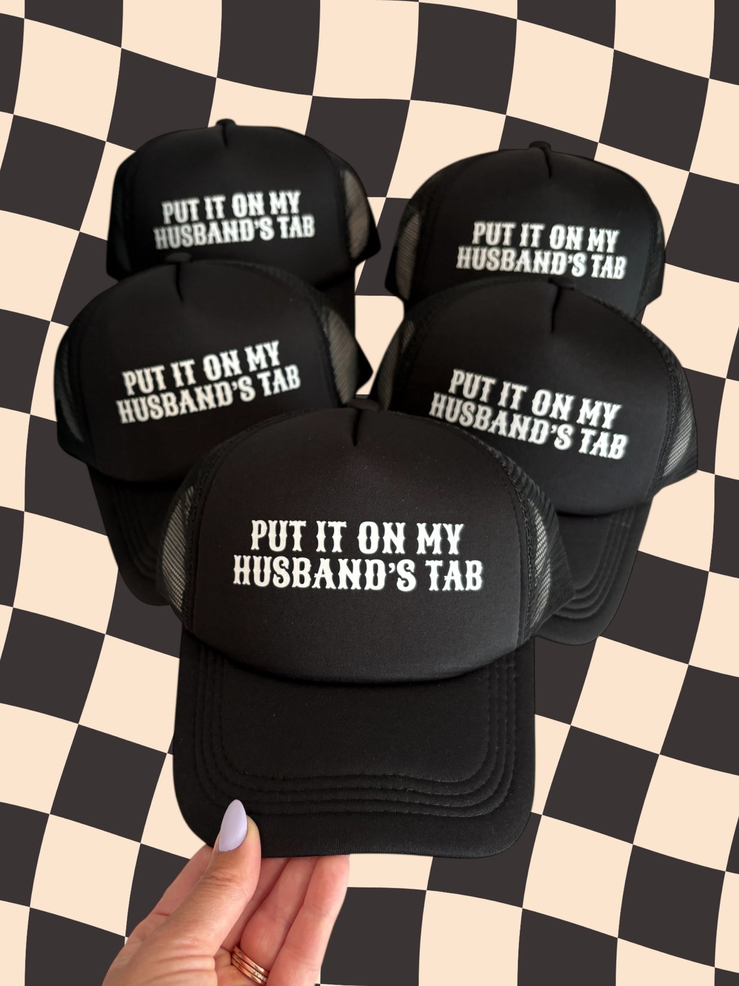 Put it on my husbands tab black and white trucker hat